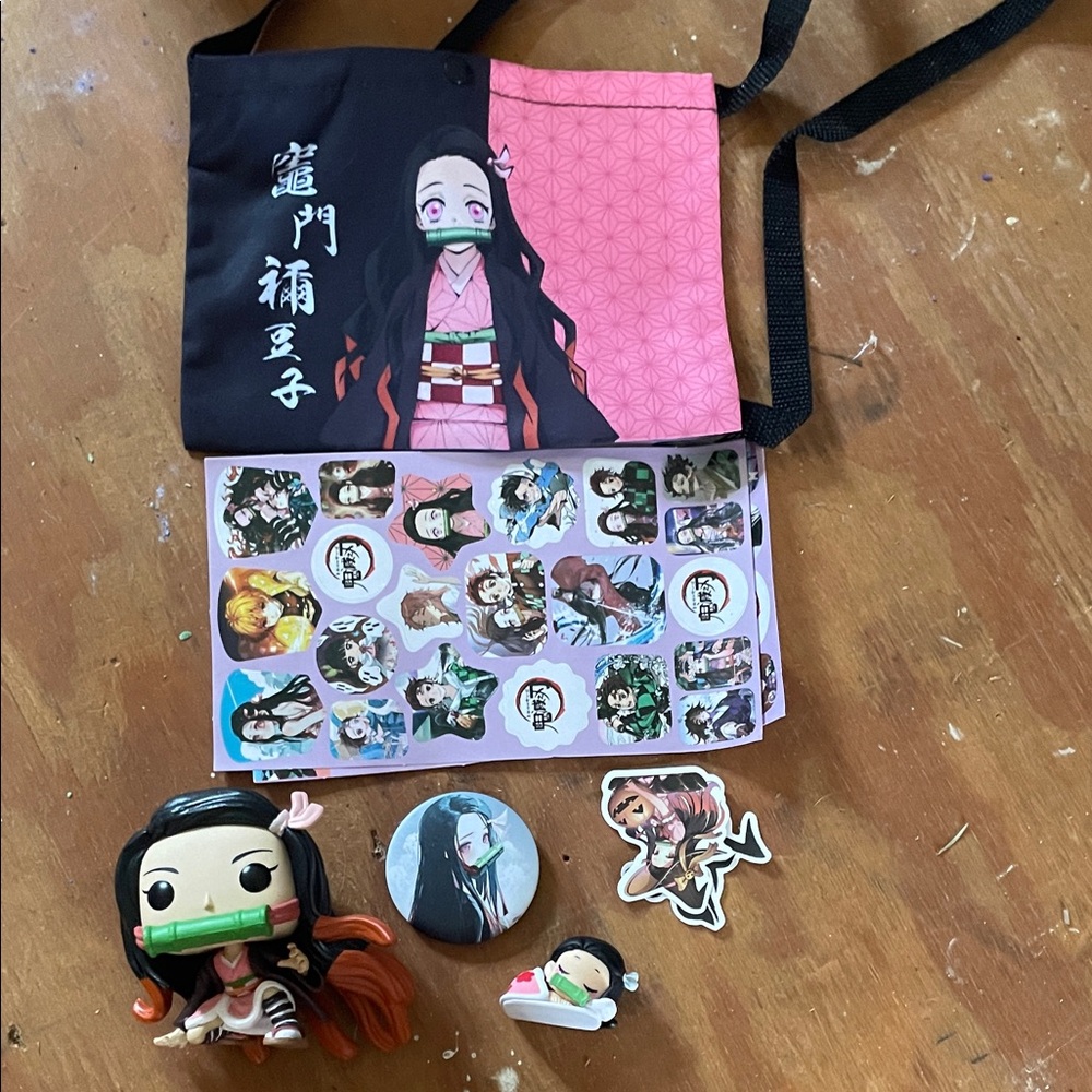 DEMON SLAYER figure. Anime Character Kids Toy Set with Pink and Black Bag
